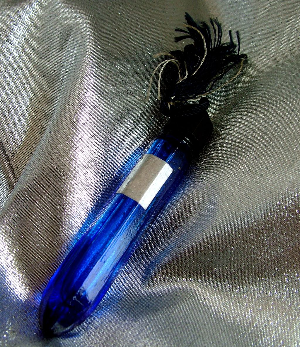 Vintage cobalt blue Evening in Paris purse bottle with tassel Vintage cobalt blue Evening in Paris purse bottle with tassel