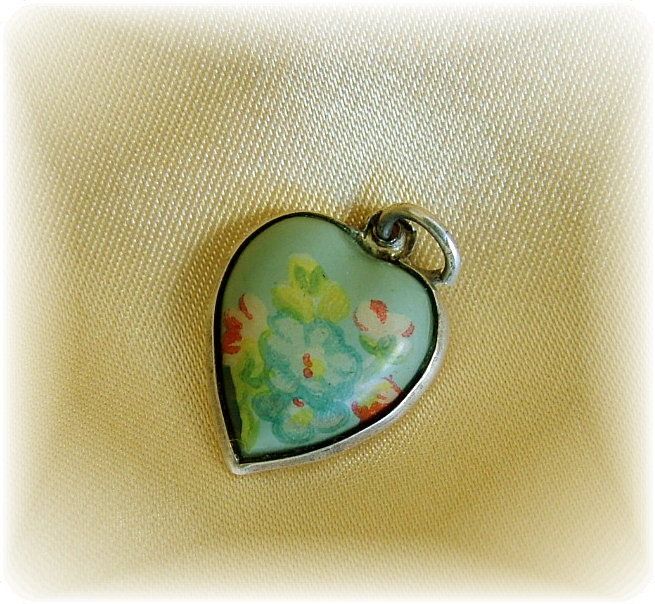 Rare vintage celluloid and sterling silver puffy heart charm Rare vintage celluloid and sterling silver puffy heart charm