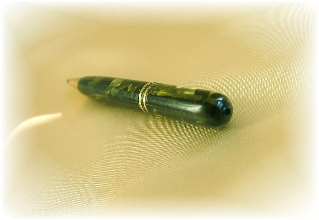 Vintage mechanical pencil with green and black marbling Vintage mechanical pencil with green and black marbling