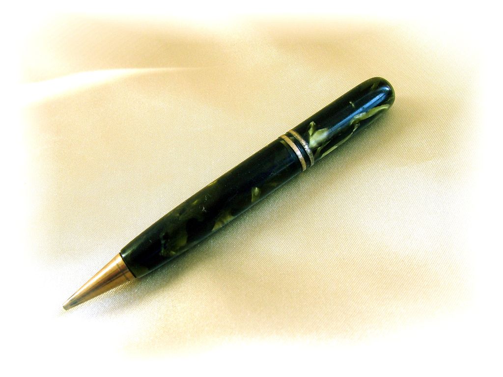 Vintage mechanical pencil with green and black marbling Vintage mechanical pencil with green and black marbling