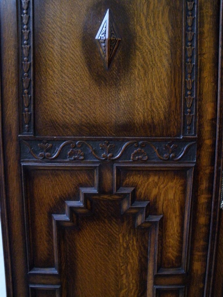 Antique English Carved Oak Jacobean Style Wardrobe Armoire. Antique English Carved Oak Jacobean Style Wardrobe Armoire.