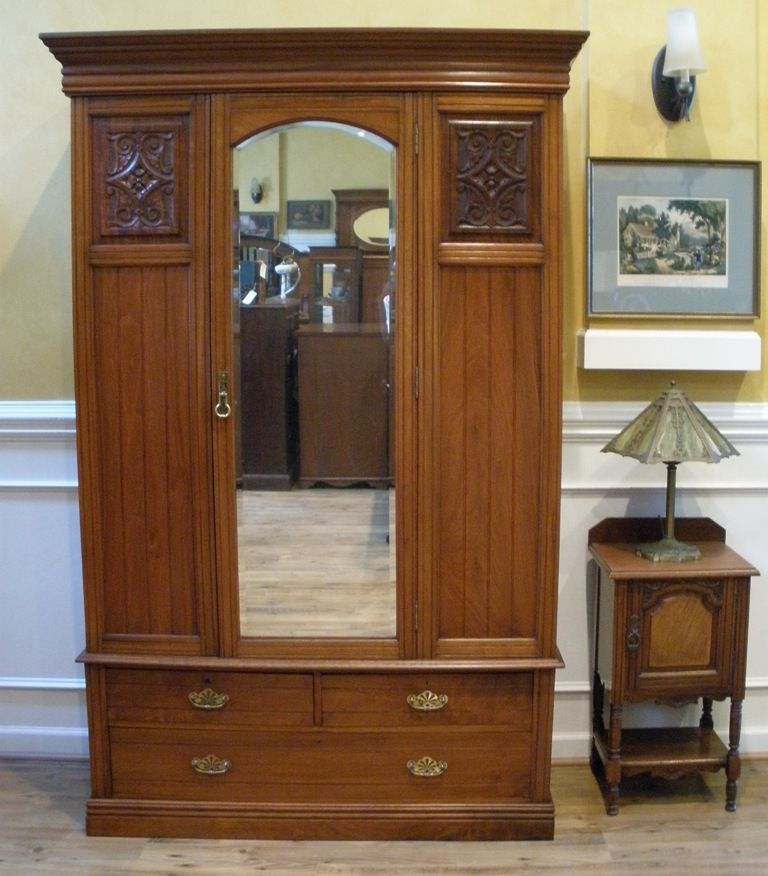 Antique English Carved Walnut Mirrored Wardrobe, Armoire. Antique English Carved Walnut Mirrored Wardrobe, Armoire.