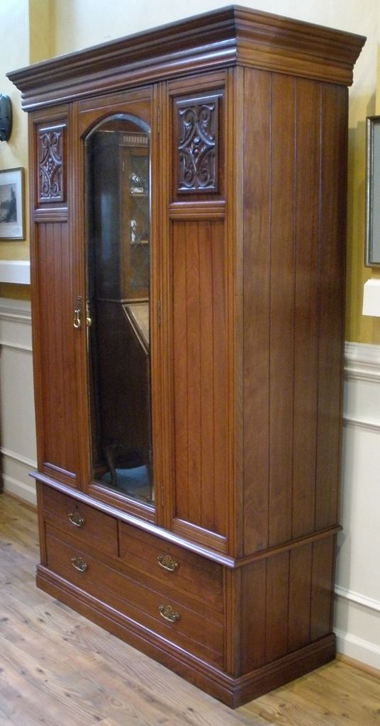 Antique English Carved Walnut Mirrored Wardrobe, Armoire. Antique English Carved Walnut Mirrored Wardrobe, Armoire.