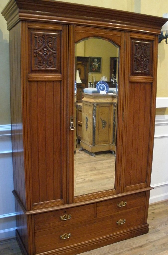 Antique English Carved Walnut Mirrored Wardrobe, Armoire. Antique English Carved Walnut Mirrored Wardrobe, Armoire.