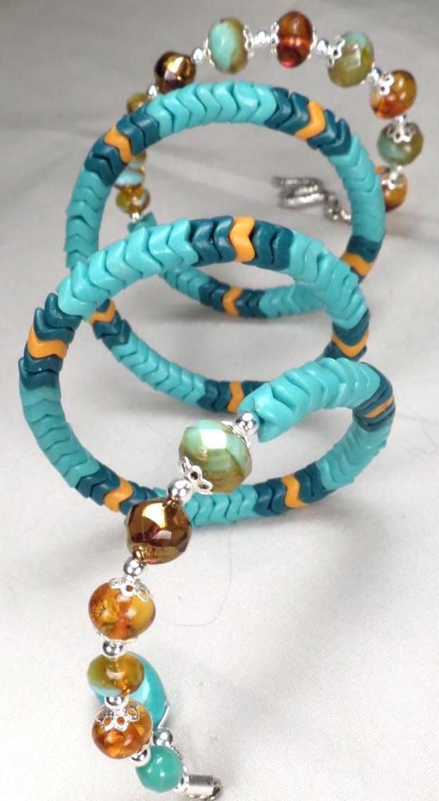 ARIADNE Snake Coil Bracelet Amber Turquoise African Snake Beads Serpent Charm ARIADNE Snake Coil Bracelet Amber Turquoise African Snake Beads Serpent Charm