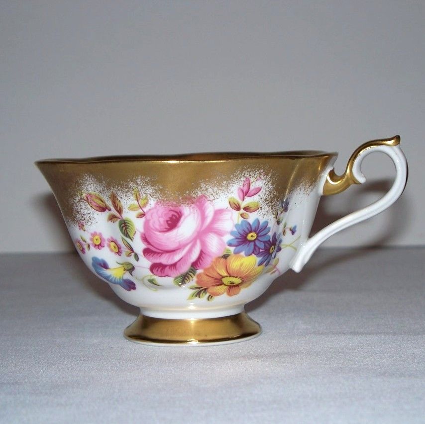 Royal Albert Heavy Gold and Floral Tea Cup and Saucer Royal Albert Heavy Gold and Floral Tea Cup and Saucer