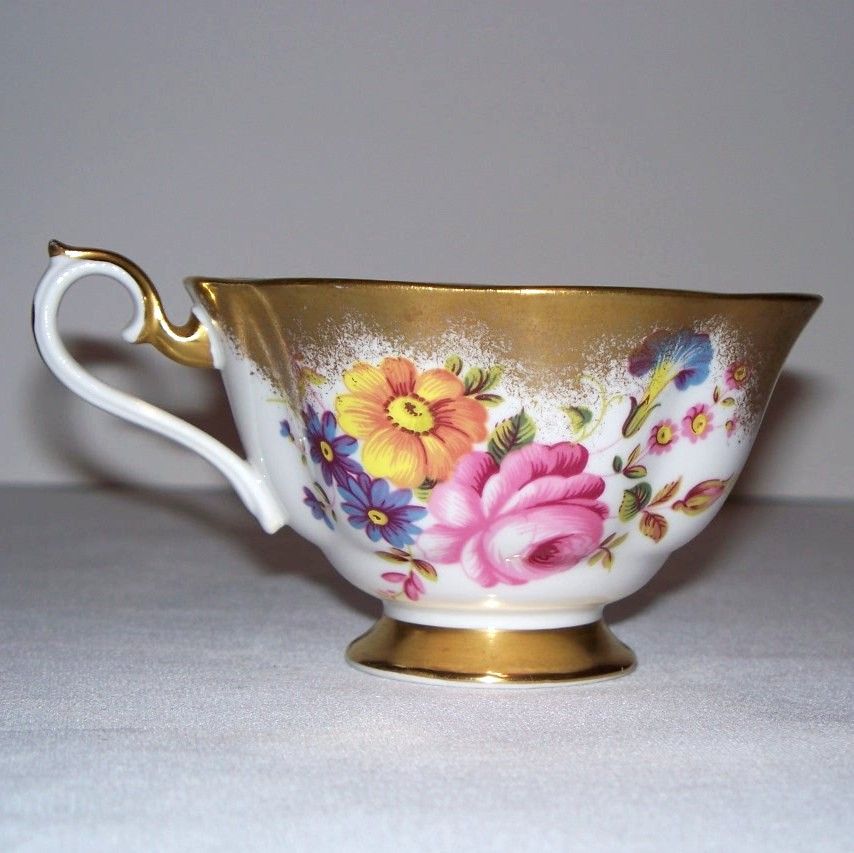 Royal Albert Heavy Gold and Floral Tea Cup and Saucer Royal Albert Heavy Gold and Floral Tea Cup and Saucer