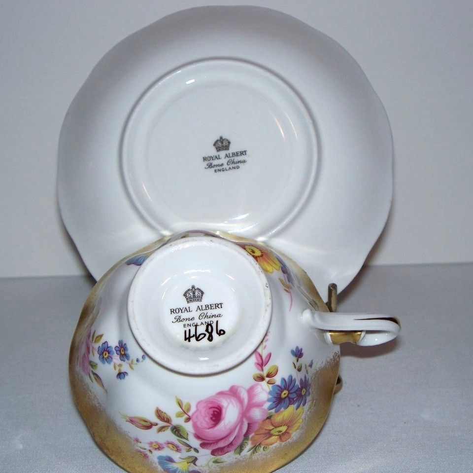 Royal Albert Heavy Gold and Floral Tea Cup and Saucer Royal Albert Heavy Gold and Floral Tea Cup and Saucer