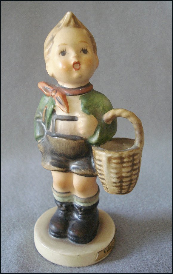 M. I. Hummel Goebel "Village Boy" Figurine - Young Boy with Basket M. I. Hummel Goebel "Village Boy" Figurine - Young Boy with Basket