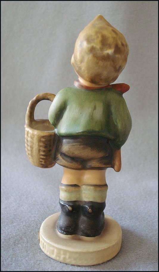 M. I. Hummel Goebel "Village Boy" Figurine - Young Boy with Basket M. I. Hummel Goebel "Village Boy" Figurine - Young Boy with Basket