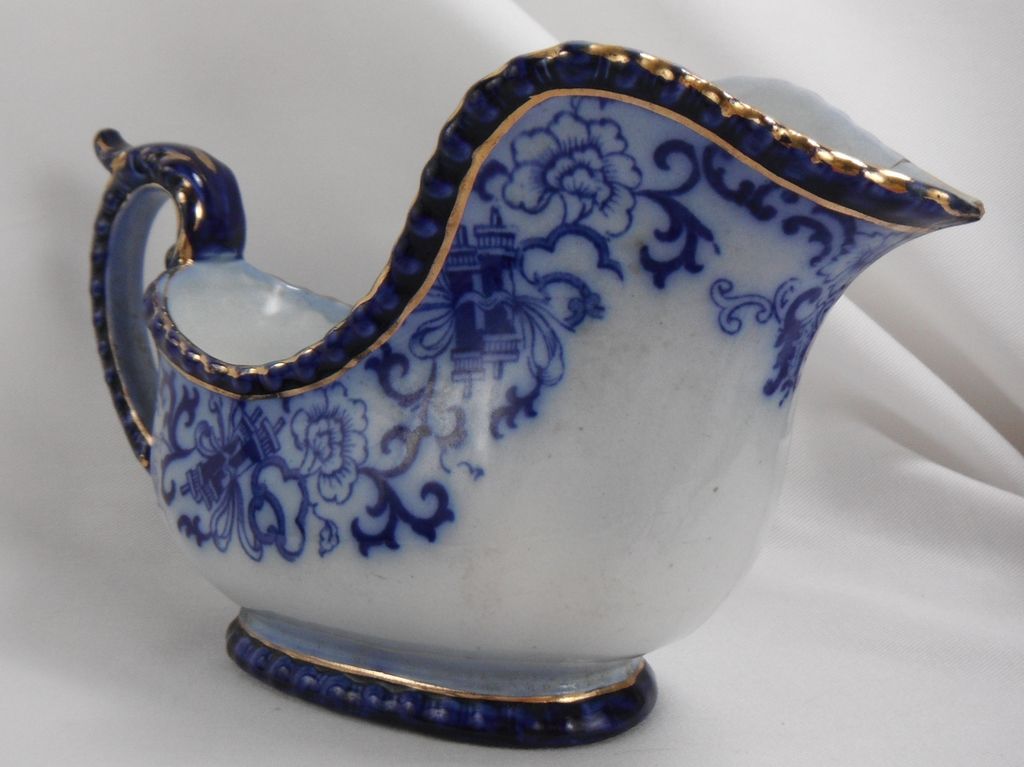 Damaged Flow Blue Gravy Boat, Nankin by Royal Doulton, 1890s Damaged Flow Blue Gravy Boat, Nankin by Royal Doulton, 1890s