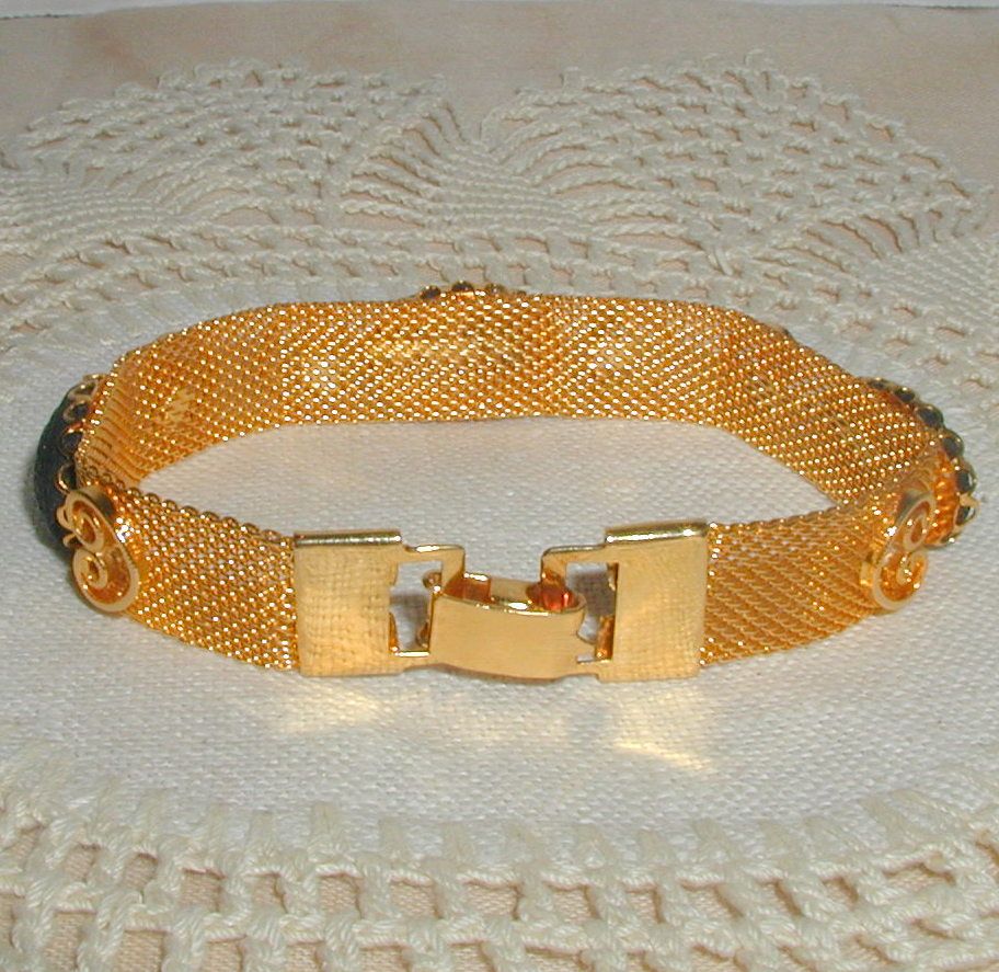 Gold-tone Mesh Bracelet with Black Floral Glass Cabochons Gold-tone Mesh Bracelet with Black Floral Glass Cabochons