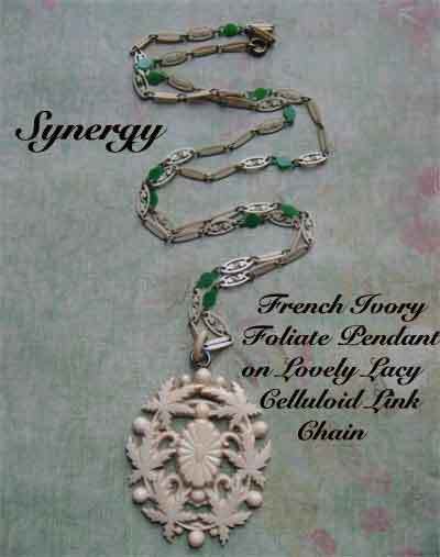 French Ivory Foliate Pendant On Lacy Celluloid Linked Chain French Ivory Foliate Pendant On Lacy Celluloid Linked Chain