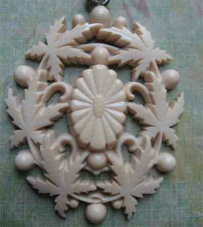 French Ivory Foliate Pendant On Lacy Celluloid Linked Chain French Ivory Foliate Pendant On Lacy Celluloid Linked Chain