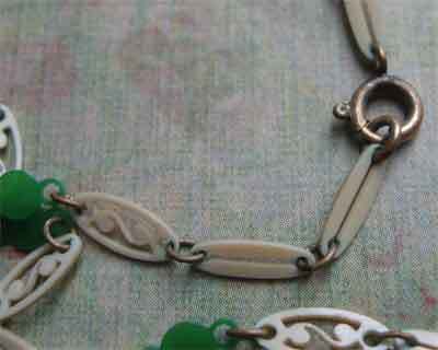 French Ivory Foliate Pendant On Lacy Celluloid Linked Chain French Ivory Foliate Pendant On Lacy Celluloid Linked Chain