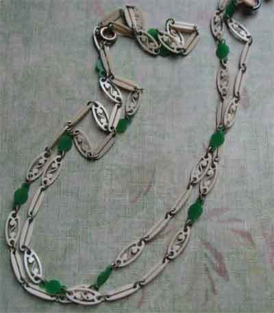 French Ivory Foliate Pendant On Lacy Celluloid Linked Chain French Ivory Foliate Pendant On Lacy Celluloid Linked Chain
