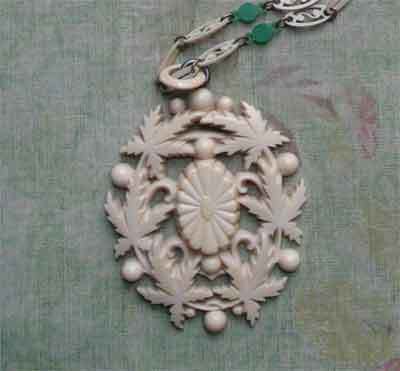 French Ivory Foliate Pendant On Lacy Celluloid Linked Chain French Ivory Foliate Pendant On Lacy Celluloid Linked Chain