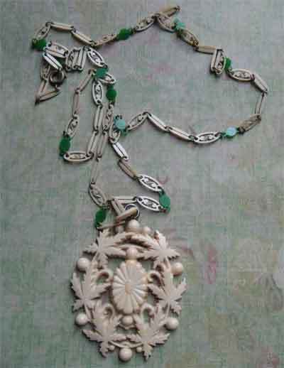 French Ivory Foliate Pendant On Lacy Celluloid Linked Chain French Ivory Foliate Pendant On Lacy Celluloid Linked Chain