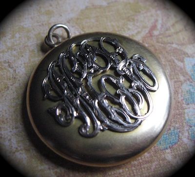 Art Nouveau Locket With Applied Fancy Intertwined Script Monogram Art Nouveau Locket With Applied Fancy Intertwined Script Monogram