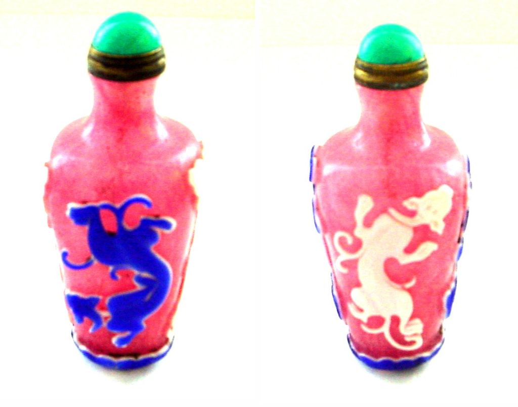 Peking Glass Snuff Bottle - Chilongs on Pink Snowflake Ground Peking Glass Snuff Bottle - Chilongs on Pink Snowflake Ground