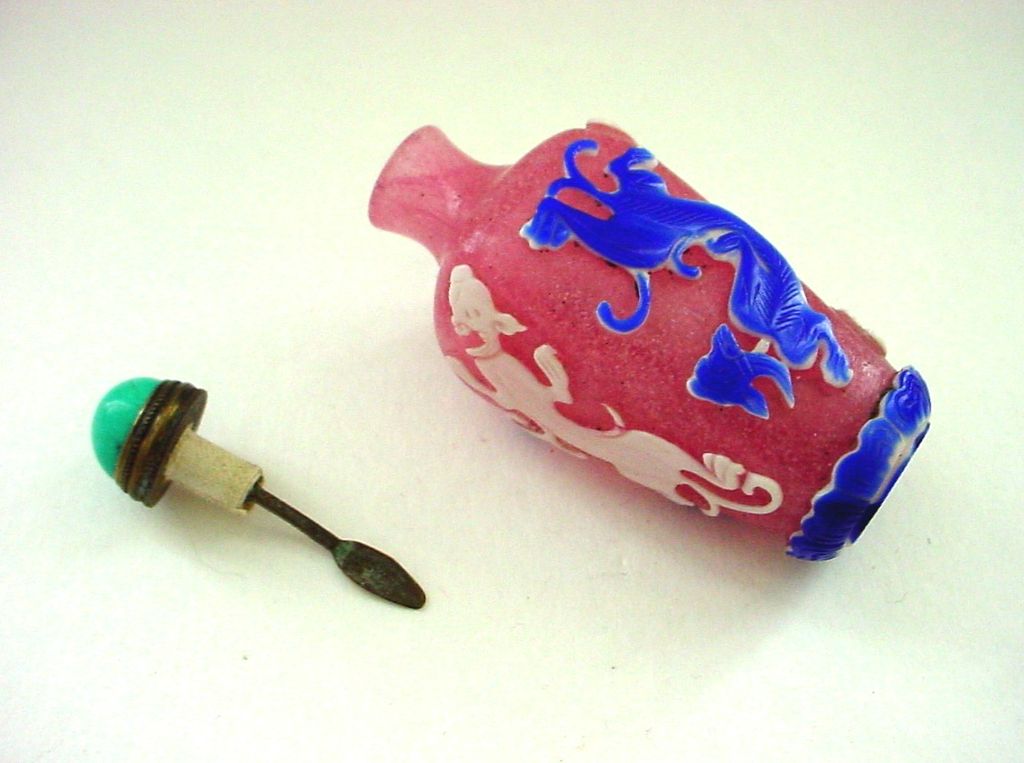 Peking Glass Snuff Bottle - Chilongs on Pink Snowflake Ground Peking Glass Snuff Bottle - Chilongs on Pink Snowflake Ground