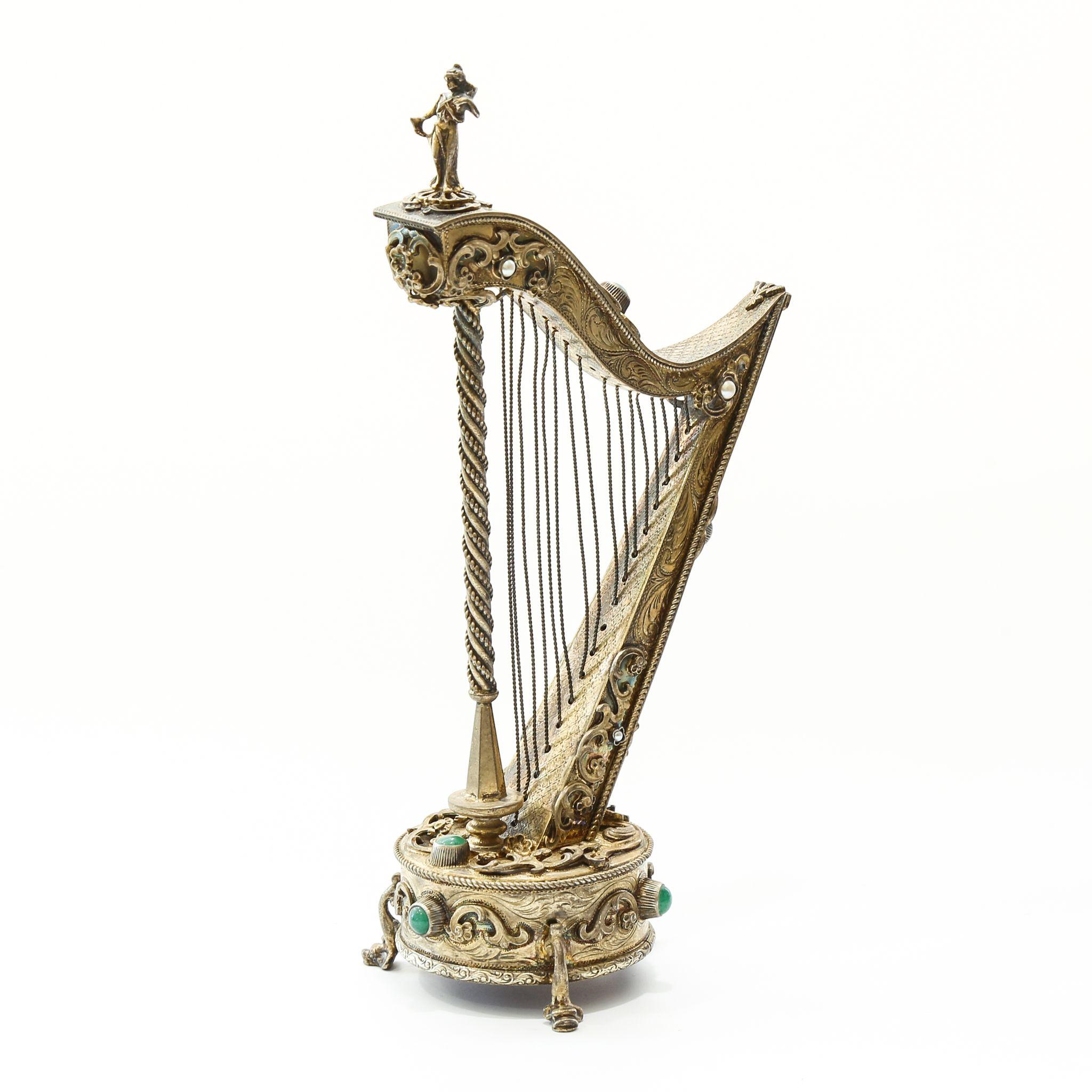 Antique Austrian Gilt Silver Jeweled Music Box In The Shape Of A Harp Antique Austrian Gilt Silver Jeweled Music Box In The Shape Of A Harp