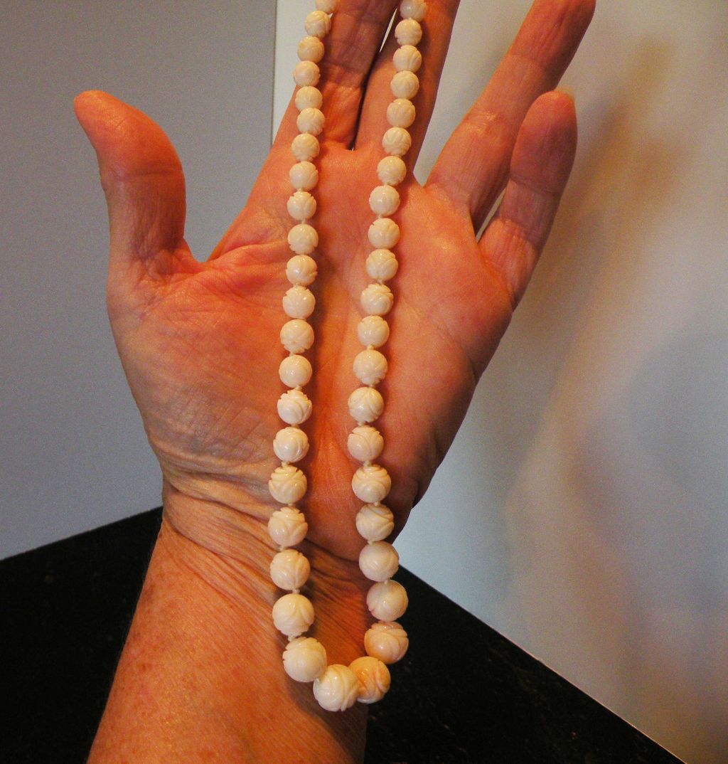 Carved White Coral Beaded Necklace 16 inches- 7.41mm-11.02 mm Carved White Coral Beaded Necklace 16 inches- 7.41mm-11.02 mm