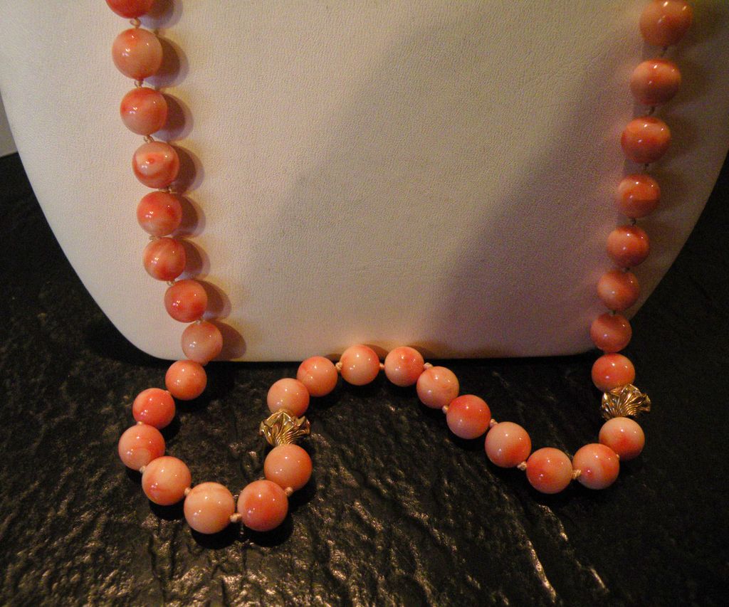Mottled Mediterranean Angel Skin Coral 38" 9.27-9.54 mm 98 grams 14 kt beads Mottled Mediterranean Angel Skin Coral 38" 9.27-9.54 mm 98 grams 14 kt beads