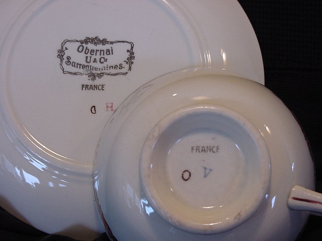 Wonderful French Cup and Saucer with Couple in Wheat Field ~ "Obernai" Pattern ~ Faïenceries Sarreguemines, Utzschneider & Co 1900-1940 Wonderful French Cup and Saucer with Couple in Wheat Field ~ "Obernai" Pattern ~ Faïenceries Sarreguemines, Utzschneider & Co 1900-1940