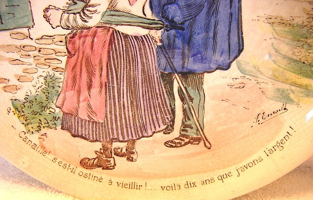 Neat French Plate with Transfer of Older Couple Reading Signs ~ UTZCHNEIDER & CO (Sarreguemines, France) - ca 1910s - 1930s Neat French Plate with Transfer of Older Couple Reading Signs ~ UTZCHNEIDER & CO (Sarreguemines, France) - ca 1910s - 1930s