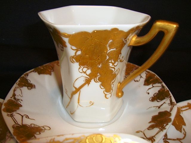 Four (4) Unique Limoges Porcelain CHOCOLATE SET Cups & Saucers ~ Grapes and Vines Hand Painted with Raised Roman Gold ~ Signed `Emma A Strahley' ~ T&V Limoges 1907-1919 Four (4) Unique Limoges Porcelain CHOCOLATE SET Cups & Saucers ~ Grapes and Vines Hand Painted with Raised Roman Gold ~ Signed `Emma A Strahley' ~ T&V Limoges 1907-1919