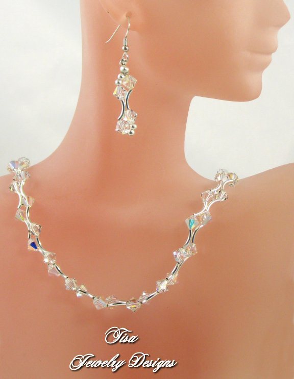 SAVANNAH NECKLACE – Stunning sparkler with double-curved sterling silver tubes and Swarovski crystals SAVANNAH NECKLACE – Stunning sparkler with double-curved sterling silver tubes and Swarovski crystals