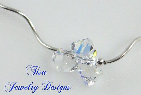 ZOE – Stunning necklace of curvy sterling silver tubes, beads and Swarovski pendant crystals ZOE – Stunning necklace of curvy sterling silver tubes, beads and Swarovski pendant crystals