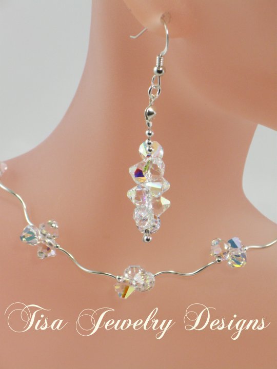 ZOE – Stunning necklace of curvy sterling silver tubes, beads and Swarovski pendant crystals ZOE – Stunning necklace of curvy sterling silver tubes, beads and Swarovski pendant crystals