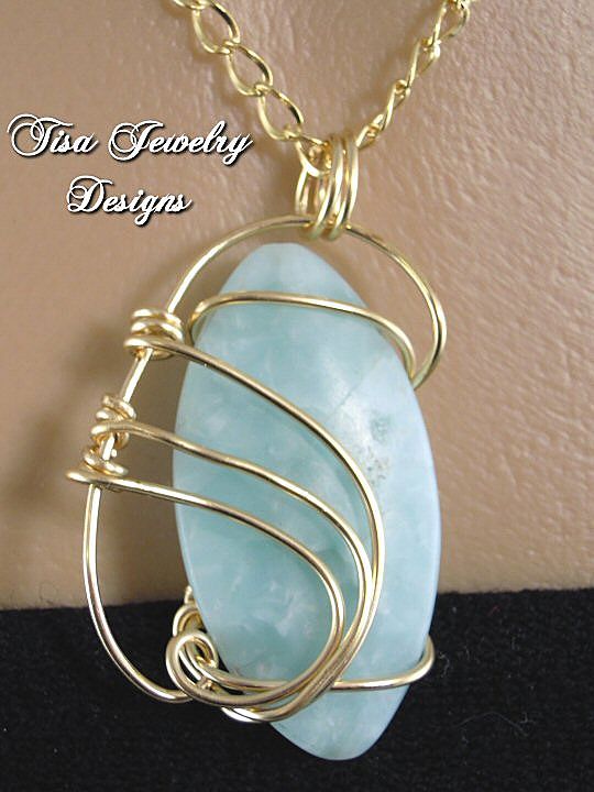 LIGHT GREEN JADE PENDANT – hand-wrapped in 14 Kt gold-fill LIGHT GREEN JADE PENDANT – hand-wrapped in 14 Kt gold-fill