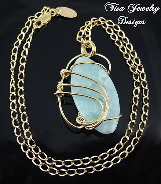 LIGHT GREEN JADE PENDANT – hand-wrapped in 14 Kt gold-fill LIGHT GREEN JADE PENDANT – hand-wrapped in 14 Kt gold-fill