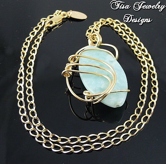 LIGHT GREEN JADE PENDANT – hand-wrapped in 14 Kt gold-fill LIGHT GREEN JADE PENDANT – hand-wrapped in 14 Kt gold-fill