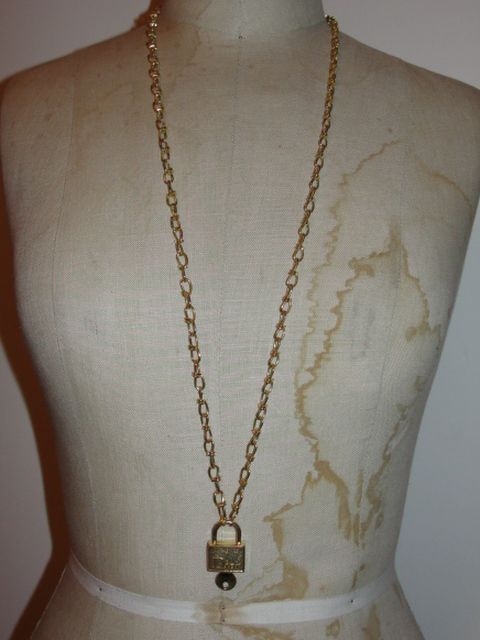 18 kt Gold Plated Dior Pad Lock and Barbed Wire Chain Necklace 18 kt Gold Plated Dior Pad Lock and Barbed Wire Chain Necklace