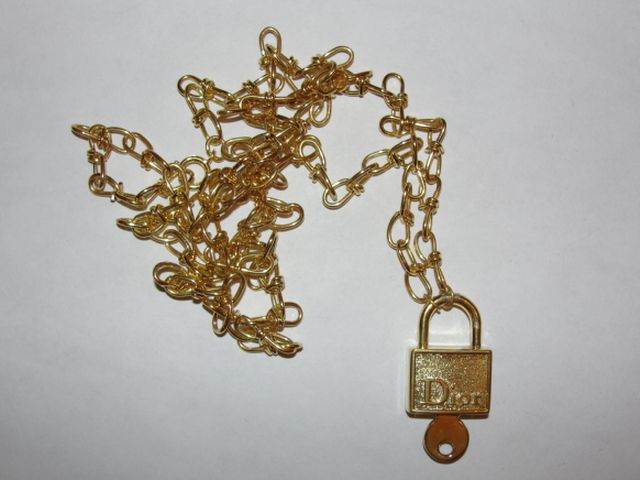18 kt Gold Plated Dior Pad Lock and Barbed Wire Chain Necklace 18 kt Gold Plated Dior Pad Lock and Barbed Wire Chain Necklace