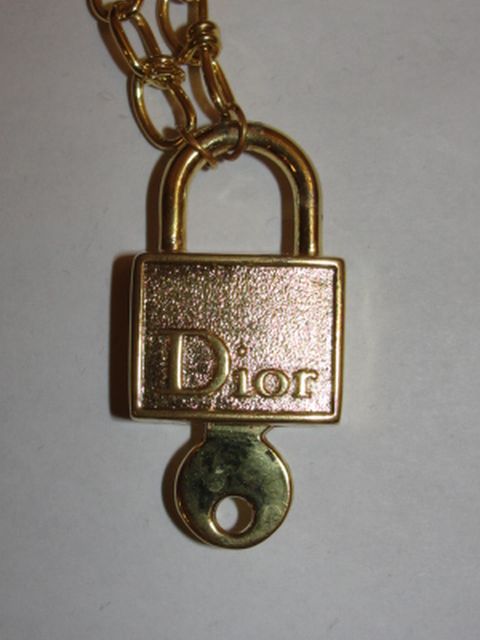 18 kt Gold Plated Dior Pad Lock and Barbed Wire Chain Necklace 18 kt Gold Plated Dior Pad Lock and Barbed Wire Chain Necklace
