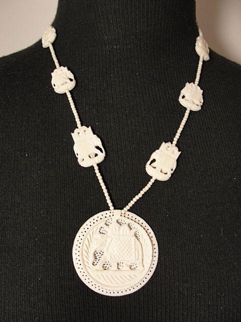 Ivory Necklace with Carved Elephant Beads and Elephant Disc Pendant Ivory Necklace with Carved Elephant Beads and Elephant Disc Pendant