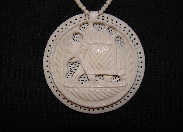 Ivory Necklace with Carved Elephant Beads and Elephant Disc Pendant Ivory Necklace with Carved Elephant Beads and Elephant Disc Pendant