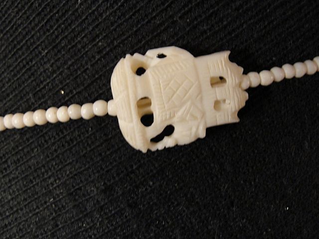 Ivory Necklace with Carved Elephant Beads and Elephant Disc Pendant Ivory Necklace with Carved Elephant Beads and Elephant Disc Pendant