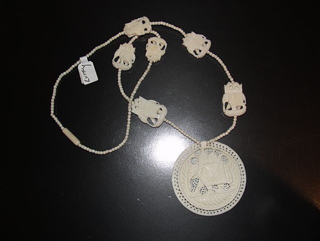 Ivory Necklace with Carved Elephant Beads and Elephant Disc Pendant Ivory Necklace with Carved Elephant Beads and Elephant Disc Pendant