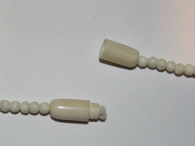 Ivory Necklace with Carved Elephant Beads and Elephant Disc Pendant Ivory Necklace with Carved Elephant Beads and Elephant Disc Pendant