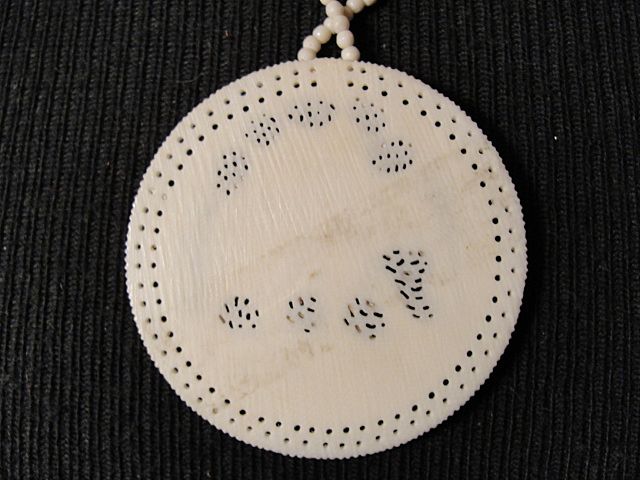 Ivory Necklace with Carved Elephant Beads and Elephant Disc Pendant Ivory Necklace with Carved Elephant Beads and Elephant Disc Pendant