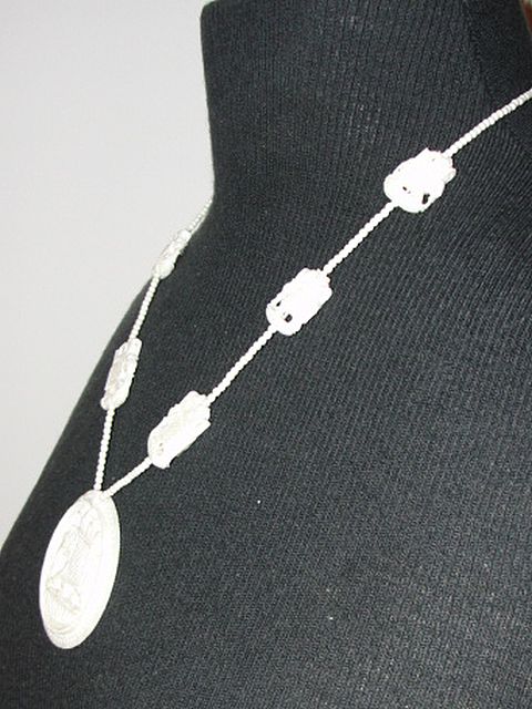 Ivory Necklace with Carved Elephant Beads and Elephant Disc Pendant Ivory Necklace with Carved Elephant Beads and Elephant Disc Pendant