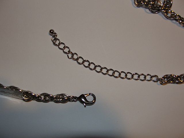 Santeria Necklace of Buffalo Teeth, Wood, and Silvertone Chain Reduced Santeria Necklace of Buffalo Teeth, Wood, and Silvertone Chain Reduced