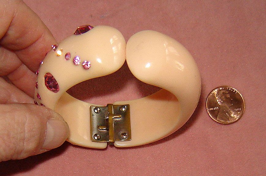 Weiss Plastic Hinged Cuff with Pink Rhinestones Weiss Plastic Hinged Cuff with Pink Rhinestones