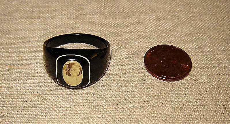 Black Celluloid Ring with Young Girl's Photograph Black Celluloid Ring with Young Girl's Photograph